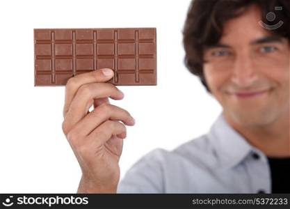 guy holding a chocolate bar