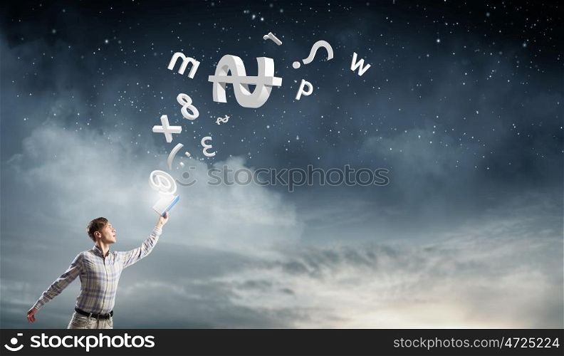 Guy studying finances. Young man in casual holding opened book with currency signs flying out