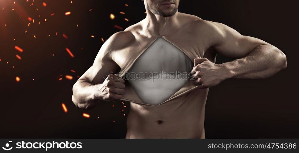 Guy teraing up his chest skin