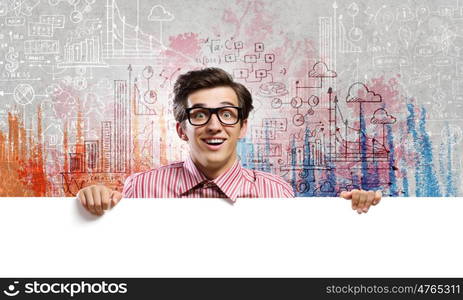Guy with banner. Young man in casual holding white blank banner