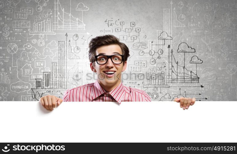 Guy with banner. Young man in casual holding white blank banner