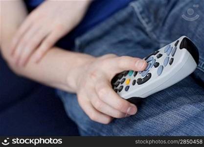 Guy with tv remote
