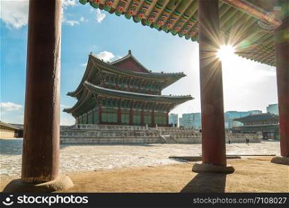 Gyeongbokgung Palace with sun flare in Seoul city, South Korea.