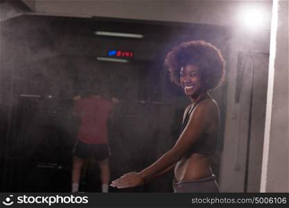 Gym Chalk Magnesium Carbonate hands clapping young african american woman for climbing workout