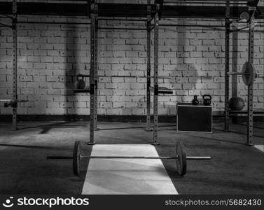Gym nobody with barbells kettlebells bars and weightlifting gear