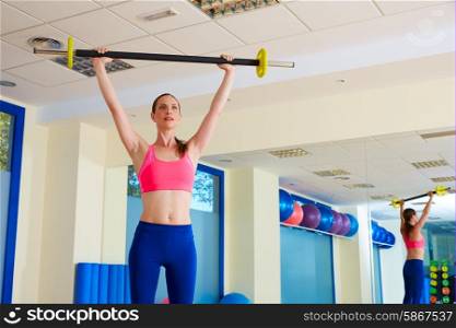 Gym woman barbell exercise workout at gym indoor