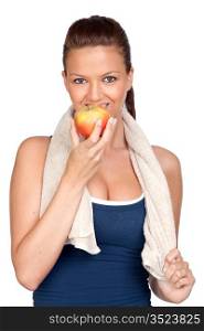 Gymnastics girl with a towel eating apple isolated on white background