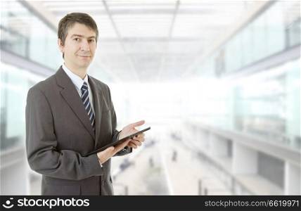 haapy businessman with a tablet pc, at the office