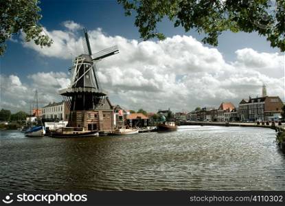 Haarlem canal and De Adriaan windmill, Holland