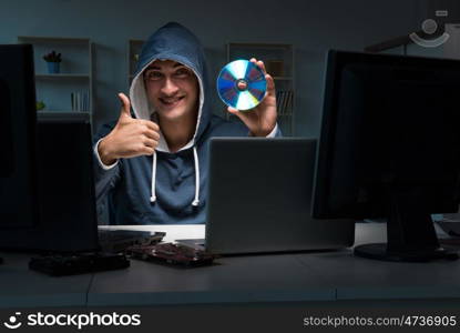 Hacker hacking computer at night