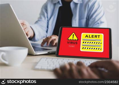 Hacker Protection Concept Man working on laptop Virus Detected Alert Digital Browsing Firewall