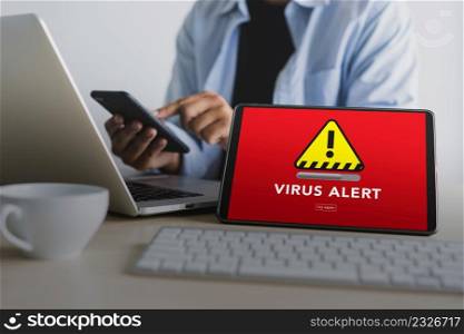 Hacker Protection Concept Man working on laptop Virus Detected Alert Digital Browsing Firewall