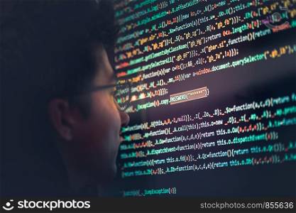 Hacker using computer, smartphone and coding to steal password and private data. Screen displaying program code, website development, application building, password and private data