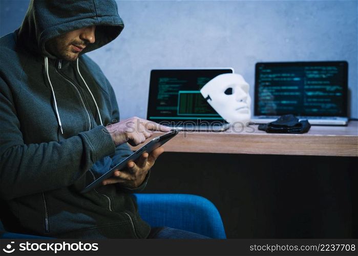 hacker using tablet