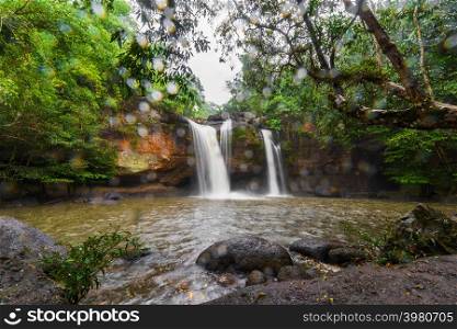 Haew Suwat Waterfall with falling rain in Khao Yai National Park, Thailand