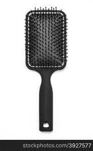 Hair brush with a black handle isolated on white