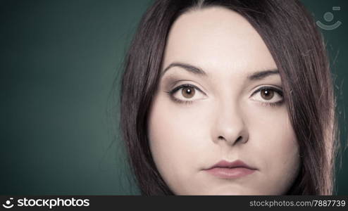 Hair care, hairdresser and hair stylist. Closeup young red haired woman with classical coiffure. Studio shot.