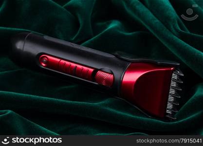 hair clipper on green background