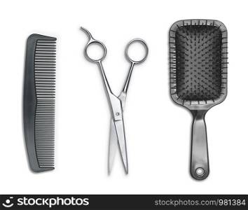 Hair cutting shears, hairbrush and comb isolated on white