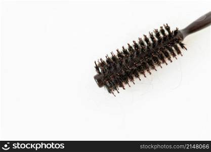 Hair loss in comb, daily serious hair loss problem, on white background. The concept of health and self-care. Hair loss in comb, daily serious hair loss problem, on white background. The concept of health and self-care.