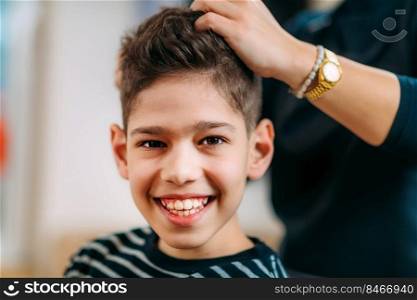 Hair styling Boy’s Hair in Hair Salon. Hair Styling Boy in Salon