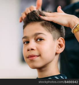 Hair styling Boy’s Hair in Hair Salon. Hair Styling Boy in Salon