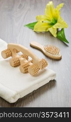 hairbrush massager and towel with flower