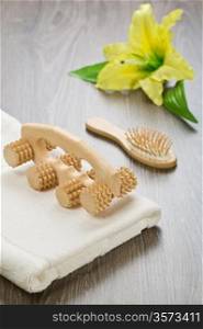 hairbrush massager and towel with flower