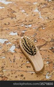 hairbrush on cork wood