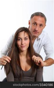 Hairdresser looking for woman&acute;s new haircut