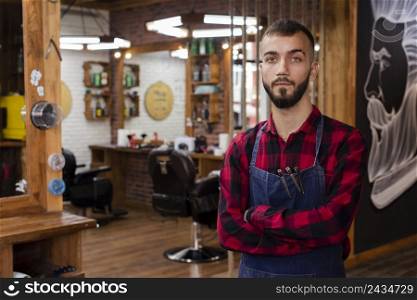 hairdresser red shirt looking camera