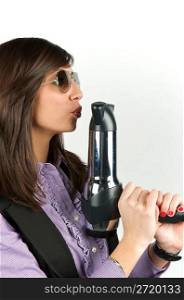 Hairdryer gun holding by a woman