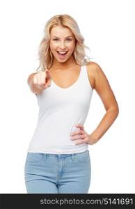 hairstyle, fashion and people concept - happy smiling beautiful young woman in white top and jeans with blonde hair. happy smiling young woman with blonde hair