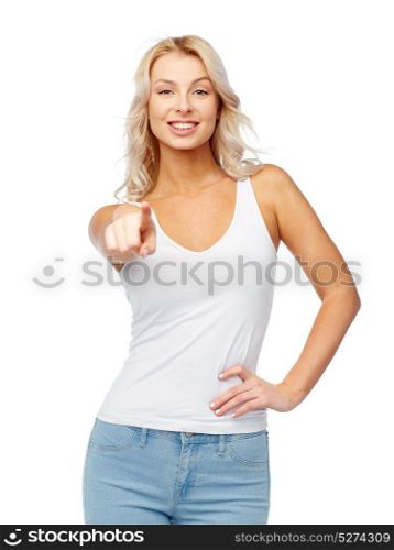 hairstyle, fashion and people concept - happy smiling beautiful young woman in white top and jeans with blonde hair. happy smiling young woman with blonde hair