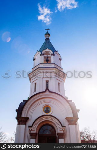 Hakodate Orthodox Church - Russian Orthodox church onion domes bell tower in winter under blue sky. Motomachi - Hakodate, Hakkaido