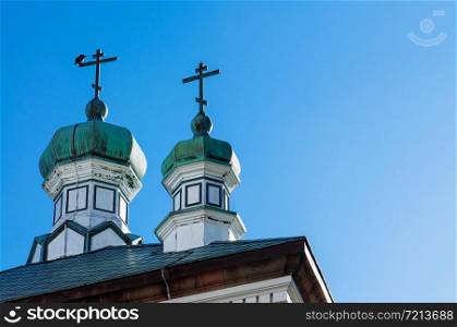 Hakodate Orthodox Church - Russian Orthodox church onion domes with cross in winter under blue sky. Motomachi - Hakodate, Hakkaido