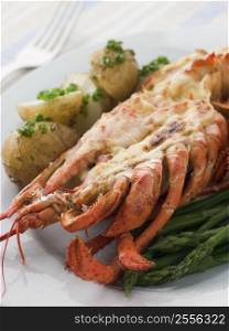 Half a Lobster Thermidor with New Potatoes and Asparagus Spears