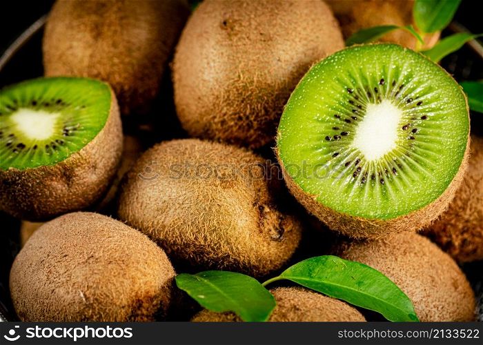 Half a ripe kiwi. Macro background. High quality photo. Half a ripe kiwi. Macro background.