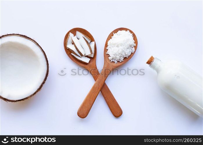 Half Coconut with coconut milk on white background.