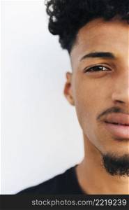 half face black young man
