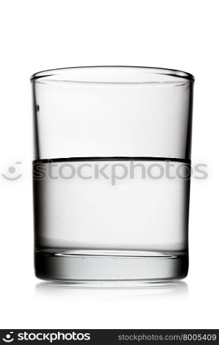 Half glass of water isolated over white background