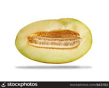 half of ripe yellow melon with seeds isolated on white backgroundclose up