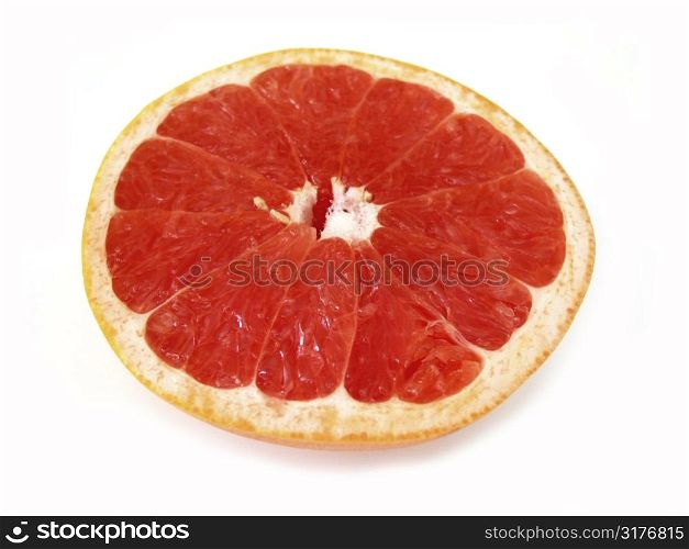 Half of ruby red grapefruit isolated on white background