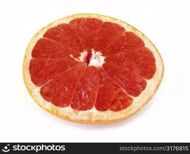 Half of ruby red grapefruit isolated on white background