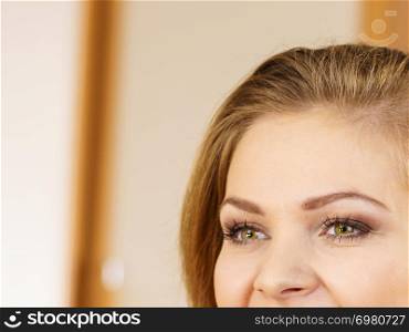 Half of young woman face. Pretty attractive female has beautiful green eyes and perfect eyebrows.. Half of woman face. Young female and her eyes