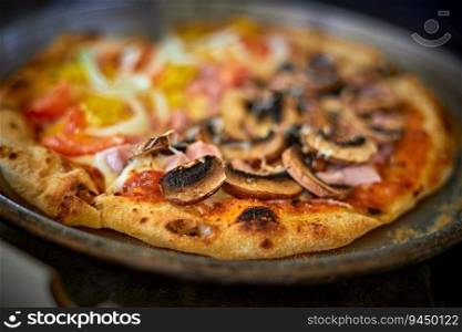 half pizza hawaiian and mushrooms, selective focus. half pizza hawaiian and mushrooms