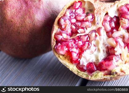 Half pomegranate in close up, horizontal image