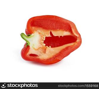 half red sweet pepper with seeds isolated on white background, close up