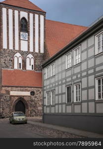 Half-timbered house and church St. Peter-und-Paul in Wusterhausen-Dosse, Ostprignitz-Ruppin, state Brandenburg,germany