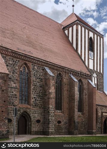 Half-timbered house and church St. Peter-und-Paul in Wusterhausen-Dosse, Ostprignitz-Ruppin, state Brandenburg,germany